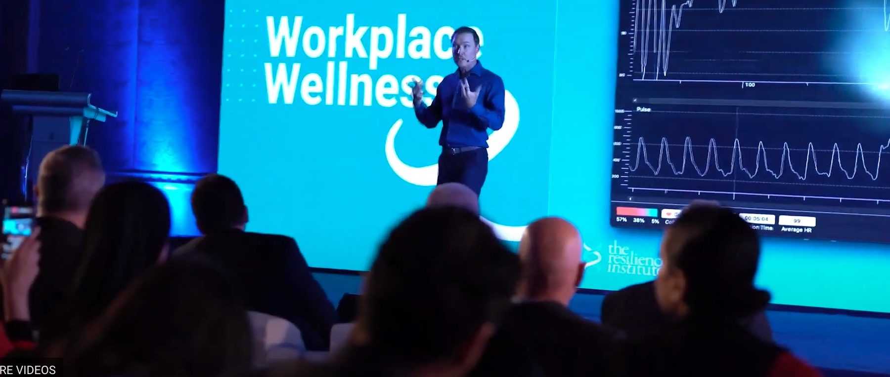 Bradley Hook speaking on stage